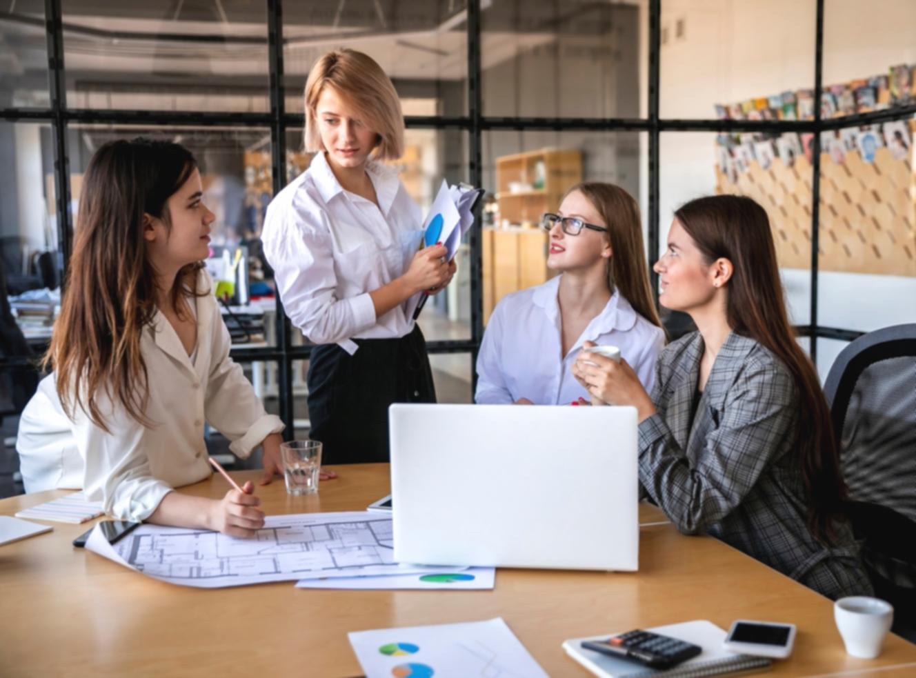 Client reviewing financial progress during consultation meeting